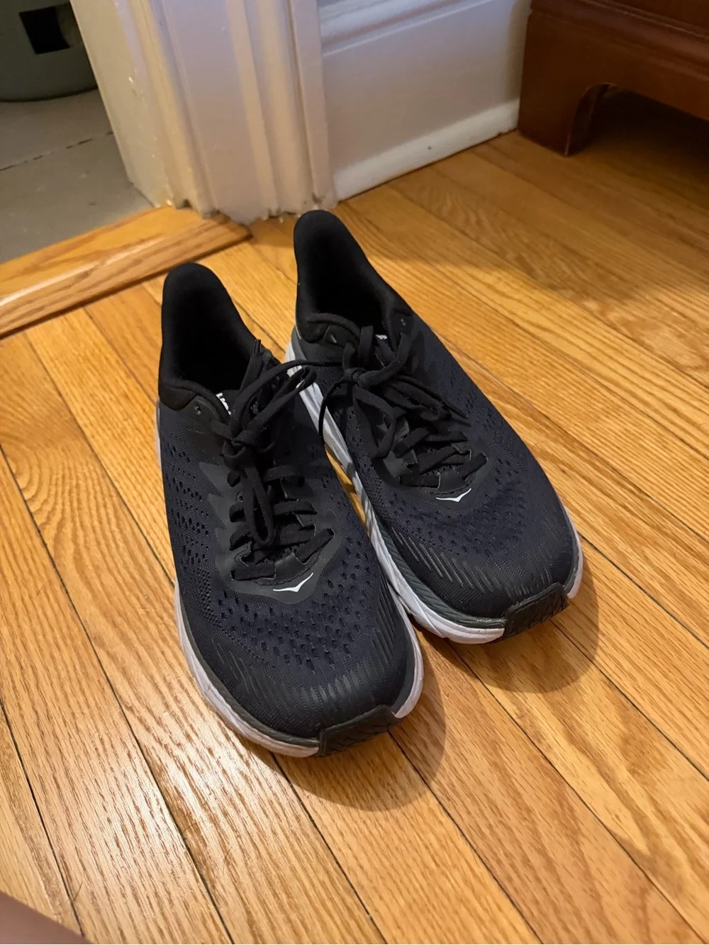 Hoka Black and White Cushioning Running Sneakers